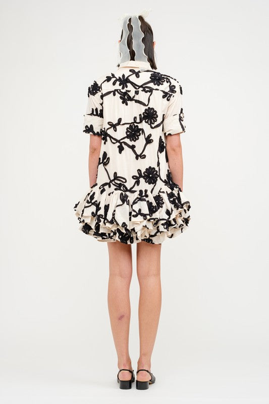 black and cream embroidered dress Karen Kane Women's Puff Sleeve Tassel Dress - Black