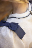 Ivory Top with Navy Bow Shoulders