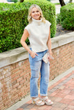 Ivory Sleeveless Turtleneck Sweater